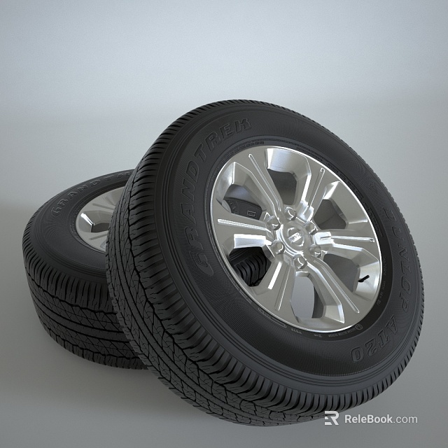 Two Modern Car Tires Featuring Shiny Silver Rims And Detailed Tread Patterns 3d model 