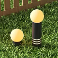 Outdoor Lights with Round Shades Dark Poles and White Stripes on Grass by Wooden Fence