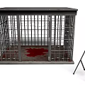 Indoor Scene Featuring Metal Cage With Bloodstain And Tripod Camera