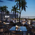 Chic Rooftop Bar With Outdoor Seating Palm Trees Candlelit Tables And Ocean Night View
