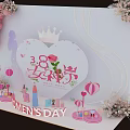 Women's Day Decorative Setup With Heart Shaped Crown Rose Cosmetic Models And Pink Balloons