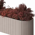 Modern Garden Planter With Vertical Striped Design And Red Foliage Plants