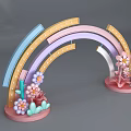Colorful Rainbow Shaped Archway With Pink Flowers And Decorative Curved Sections