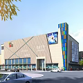 Modern Commercial Complex With Large Digital Display And Surrounding Vehicles Pedestrians Greenery