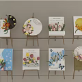 Interactive Area Display With Multiple Easels And Decorative Paintings Featuring Flowers Butterflies Letters