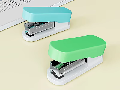 Blue And Green Staplers With White Base On Desk Near Keyboard 3d model