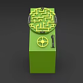 Interactive Zone Green Device With Circular Maze Yellow Knob And Black Handle 3d model