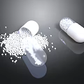 White Food Pellets Spilled From Open Capsule On Black Surface
