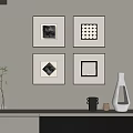 Framed Abstract Paintings As Wall Decor In Modern Home Interior With Vase And Accessories