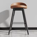 Modern Minimalist Bar Stool With Brown Leather Seat And Black Metal Legs In Interior Space