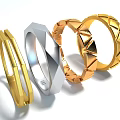 Modern Gold And Silver Rings With Geometric Patterns And Sleek Designs 3d model