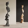 Modern Abstract Sculptures With Irregular Curved Shapes In Black And Wood Tones