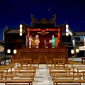 Traditional Commercial Street At Night With Traditional Architecture Lit Stalls Lotus Pond And People Walking