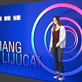 Trendy Photo Spot With Blue Background Pink Blue Circular Rings And QIANGLIJUCAN Sign