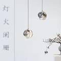 Moon Shaped Pendant Lights in Minimalist White Room With Dried Branches Decor