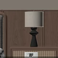 Modern Minimalist Table Lamp With Fabric Shade On Wooden Bedside Table Against Warm Wall
