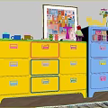 Colorful Entryway Side Cabinet With Yellow Blue Drawers And Decorative Ornaments