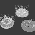 Water Splashes on Three Circular Objects with Dynamic Motion Against Black Background 3d model