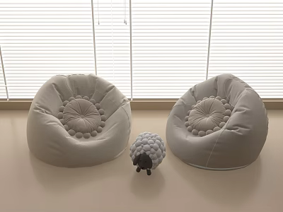 Two Light Gray Bean Bag Chairs With Decorative Center And Small Sheep Toy 3d model