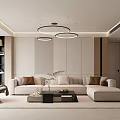 Modern Living Room Interior With Beige Sofa Circular Pendant Lights Coffee Table And Bookshelf