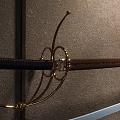 Vintage Decorative Sword With Golden Ornate Hilt Dark Blue Wrapped Handle And Wooden Scabbard