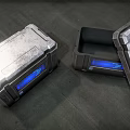 Metal Storage Cases With Blue Display Screens One Closed One Open Design 3d model