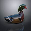 Colorful Decorative Duck Figurine With Green Head Red Beak Shiny Surface And Reflection
