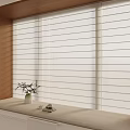 White Window Blinds on Wooden Frame with Cushioned Sill and Potted Plant