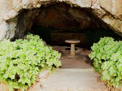 Natural Cave Landscape With Lush Green Plants Stone Pathway And Round Stone Table 3d model