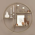Elegant Gold Circular Metal Shelving Unit Displaying Decorative Vases Candles And Ornaments