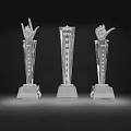 Crystal Trophies with Gesture Top Design for Award Ceremonies on Illuminated Black Background