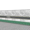 Outdoor Feature Wall With Marble Texture And Green Base Trim On Paved Ground