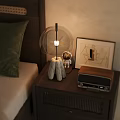 Dark Wooden Nightstand With Transparent Globe Lamp Astronaut Figurine Vintage Radio And Geometric Art Print