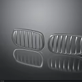 Modern Car Front Grilles Design With Silver Finish And Reflective Surface