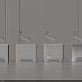 White Bathroom Washbasins With Silver Faucets And Light Colored Walls And Floor