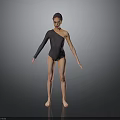 Woman in black one shoulder leotard standing barefoot on reflective floor with gray gradient background