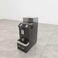 Black Coffee Machine As Modern Kitchen Appliance On Gray Tile Floor With Small Cup