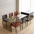 Modern Dining Table With Glass Top And Black Red Gray Chairs In Stylish Room