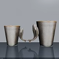 Ornamental Decor Set with Fish Shaped Handles Brown Beige Gradient Textured Cups on Gray Tabletop