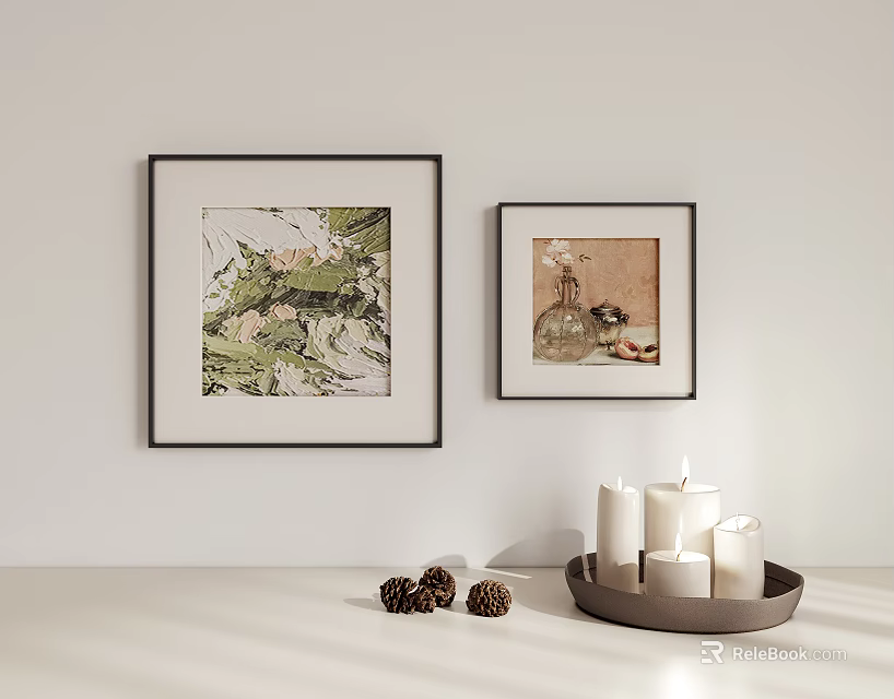 Framed Artworks On White Wall With Tabletop Candles And Decorative Pinecones 3d model 