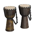 Two Traditional Wooden Musical Drums With Light Colored Heads Carved Patterns And Chain Details