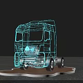 Truck Shaped Art Installation With Blue Line Outline And Neon Light Effect On Platform Base
