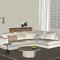 Modern Living Room Sofa and Coffee Table Set with Neutral Pillows and Floor Lamp