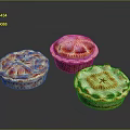 Three Decorative Homemade Pies With Golden Crust And Red Fruit Toppings