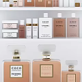 Elegant Chanel Coco Perfume And Cosmetics Collection On White Shelf