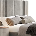 Modern Upholstered Double Bed Featuring Soft Pillows Cozy Blanket and Sleek Nightstand