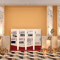 Elegant Event Hall With Marble Columns Yellow Walls Display Boards Floral Decor And Geometric Floor