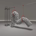 Ornamental Sculpture Combination Featuring Metal Stand And Hanging Curved Granular Design