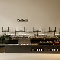Poliform Restaurant Food Display Area With Shelves Fresh Items And Green Plants