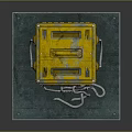 Yellow Worn Metal Cube with Gray Ropes Placed on Blue Platform Surface
